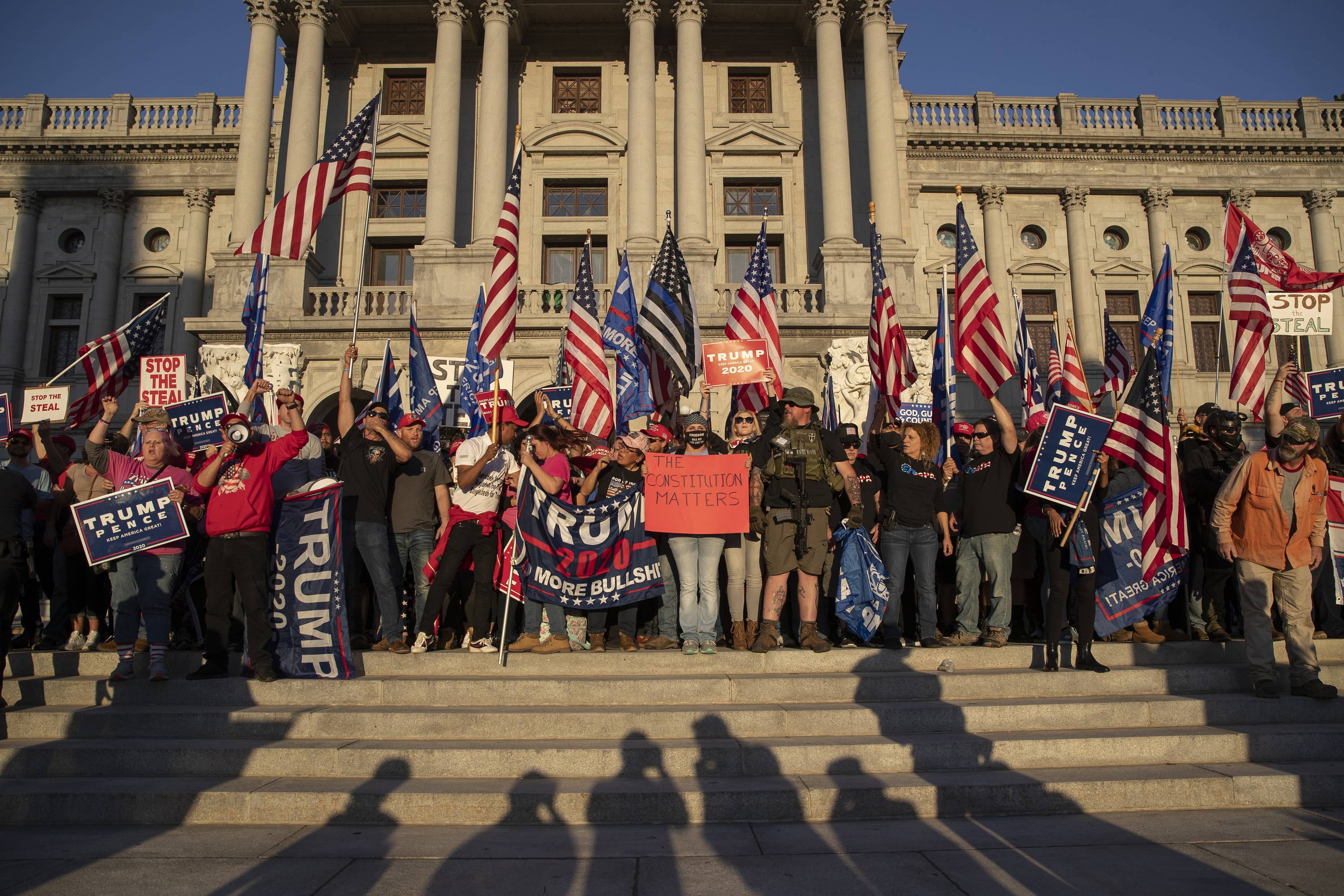 Supporters of U.S. President Donald Trump gather at the Pennsylvania State Capital in Harrisburg, Pennsylvania, on Nov. 7. | Victor J. Blue / The New York Times