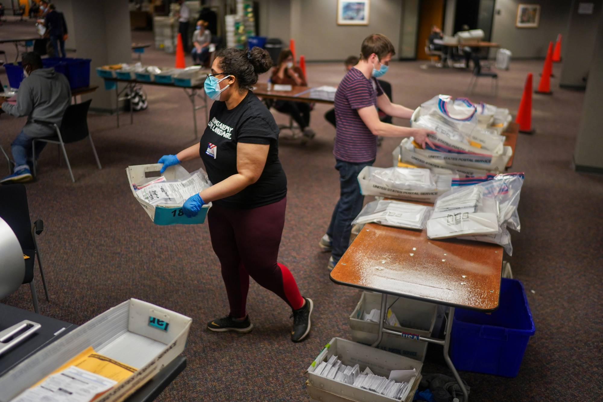 Election workers count ballots in Milwaukee, Wisconsin, on Nov. 3. | Chang W. Lee / The New York Times