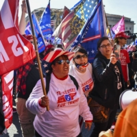 Supporters of U.S. President Donald Trump attend a Make America Great Again rally near the White House on Saturday. | KENNY HOLSTON / THE NEW YORK TIMES