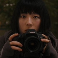 Caught on camera: Nanami Kasamatsu plays a curious teenager who decides to upend her brother’s upcoming nuptials after catching him cheating in “Me & My Brother’s Mistress.” | © 2019 “ME & MY BROTHER’S MISTRESS” PRODUCTION TEAM
