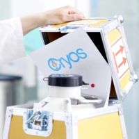 A nitrogen tank storing sperm straws inside a transport box for shipping donor sperm | CRYOS INTERNATIONAL / VIA KYODO