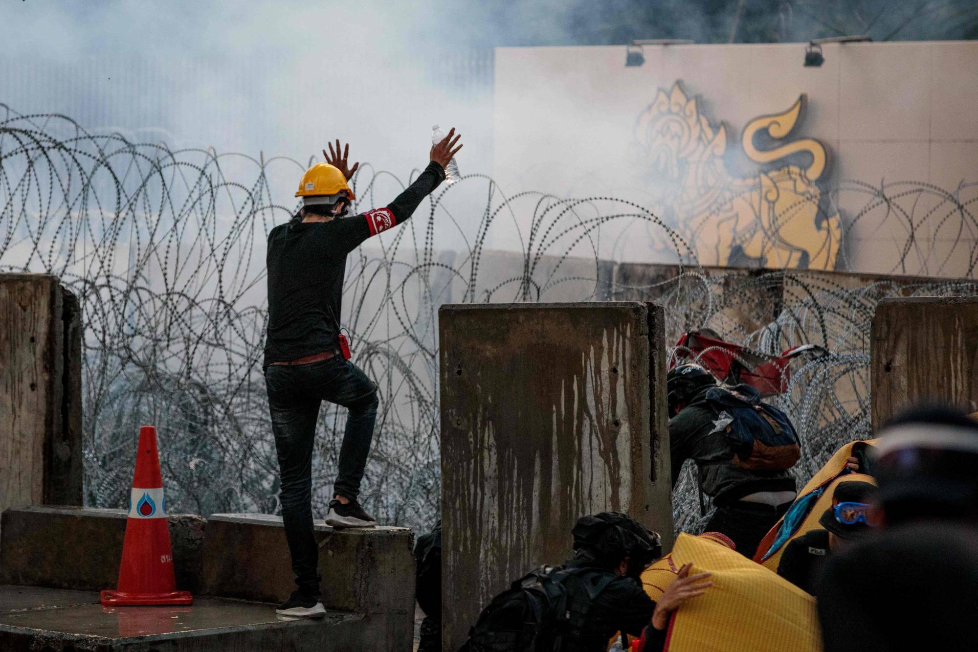 Pro-democracy protesters take part in an anti-government rally near the Thai parliament in Bangkok on Tuesday. | AFP-Jiji