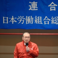 Rikio Kozu, president of the Japanese Trade Union Confederation, speaks during a rally for the spring wage negotiation in Tokyo in March 2018. | BLOOMBERG