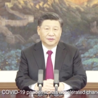 Chinese President Xi Jinping speaks at a CEO forum via video link ahead of the APEC leaders\' summit on Thursday.  | APEC CEO DIALOGUES MALAYSIA 2020 / VIA AP