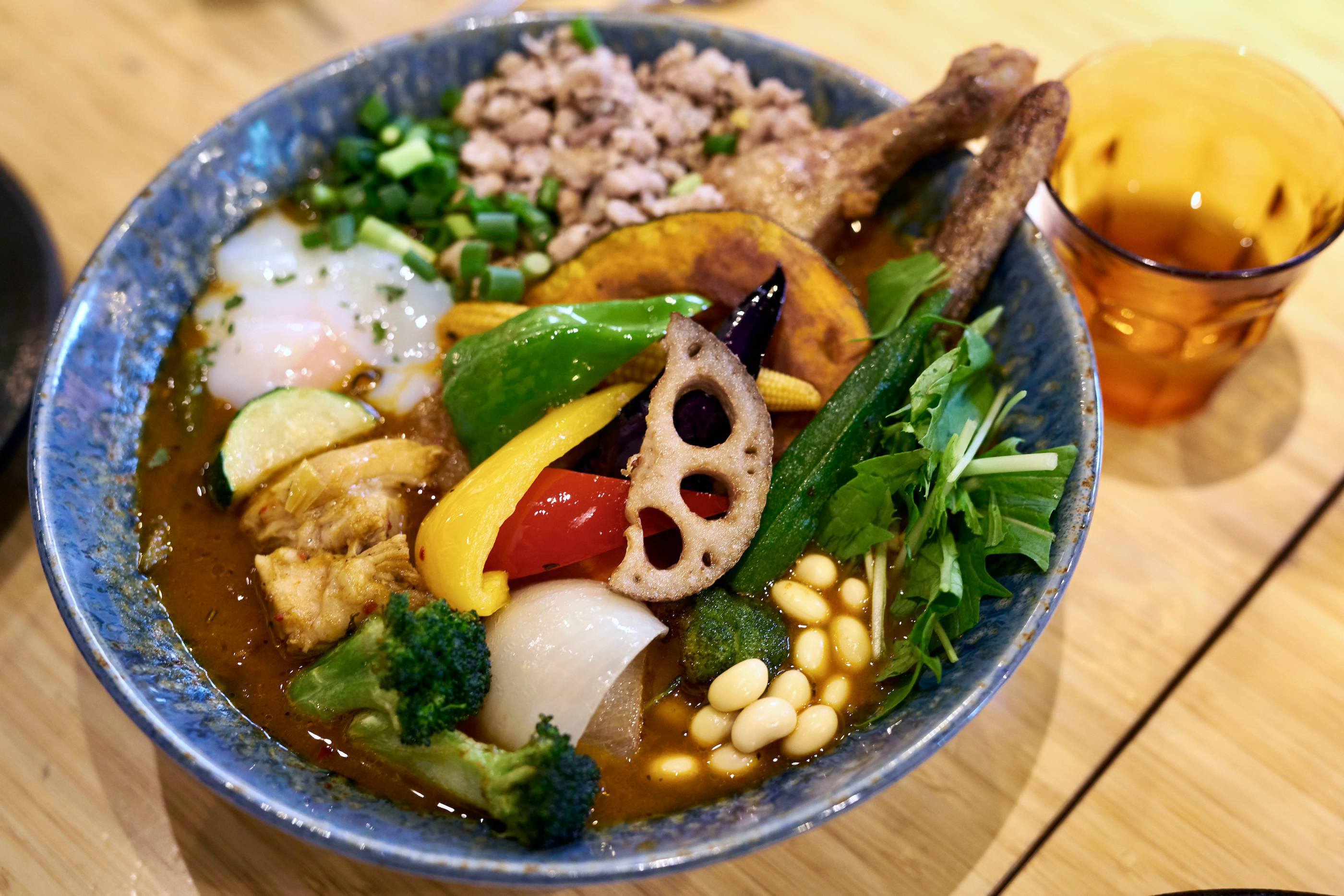 Way of the vegetable: Rojiura Curry Samurai’s signature dish stars a crispy chicken leg surrounded by a whopping 20 types of vegetables. | Florentyna Leow 