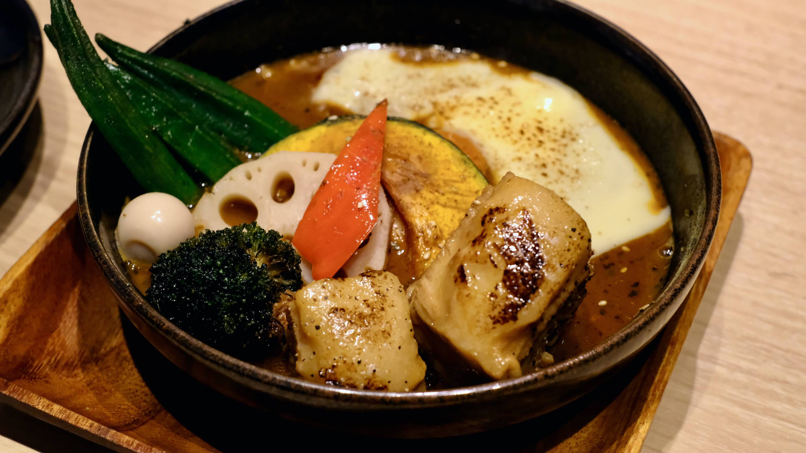 Pig out: Soup Curry Garaku’s pork belly is charred, tender and laced with just the right amount of fat. | Florentyna Leow 
