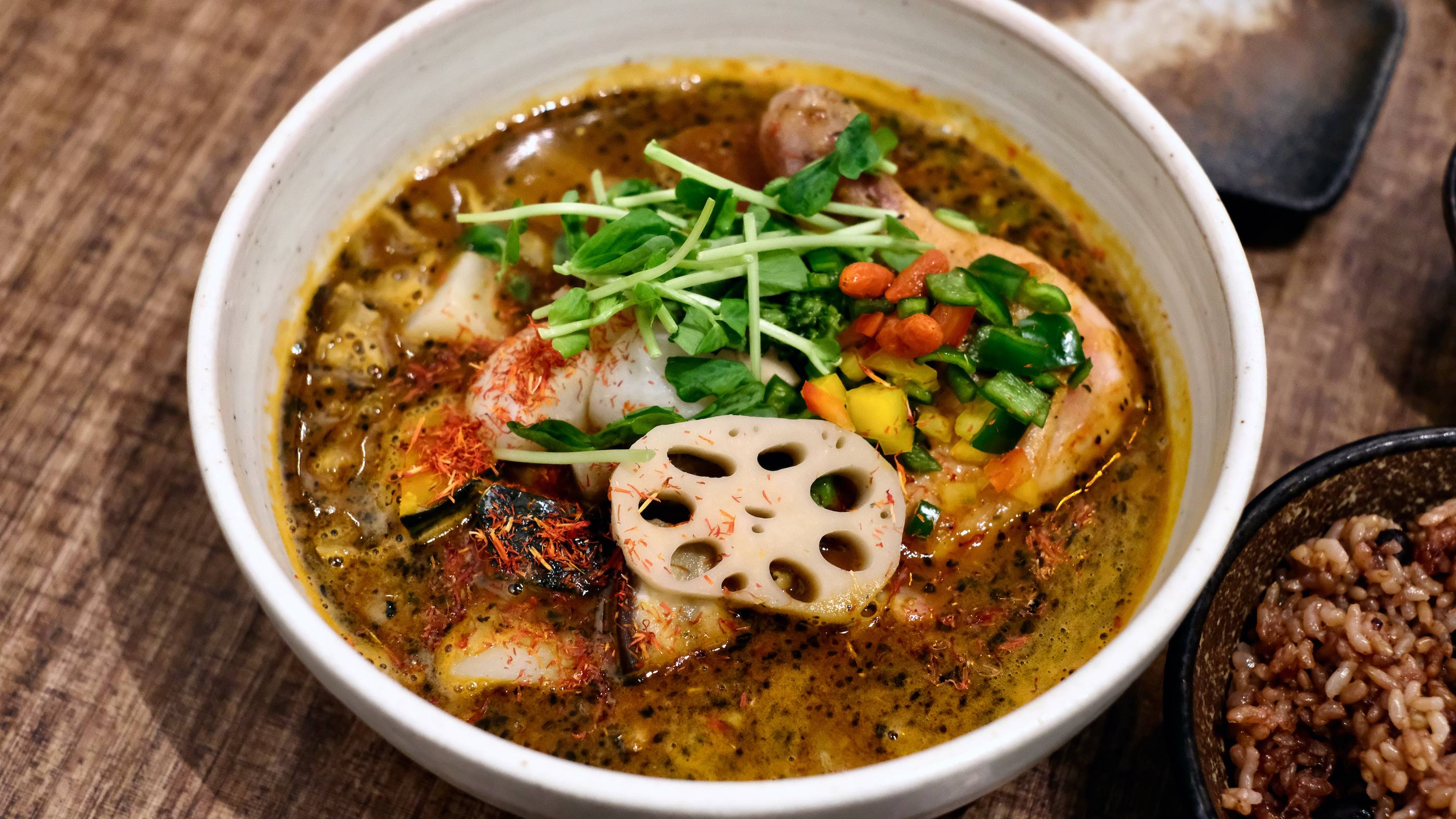 Bowled over: Yakuzen Soup Curry Shania’s offerings feature unusual toppings such as snow fungus, wood ear mushroom, butter-fried eringi and pea shoots. | Florentyna Leow 