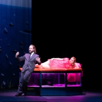 Sweet dreams: Cooper, played by American tenor Peter Tantsits (left), dreams about enjoying a happy life with his lover, Bella, in the opera, “A Dream of Armageddon.” | © MASAHIKO TERASHI / NEW NATIONAL THEATRE, TOKYO
