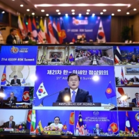 South Korean President Moon Jae-in addresses counterparts at the ASEAN-South Korea Summit of the Association of Southeast Asian Nations, in a live online videoconference in Hanoi on Nov 12. | AFP-JIJI