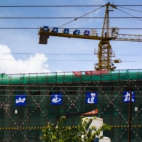 Chinese characters on a construction crane and scaffolding in Lusaka, Zambia, in December 2018 | BLOOMBERG