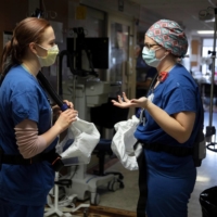 In addition to the obvious risks the virus poses to health care workers, who are disproportionately female, the attendant COVID-19 lockdown measures have led to lapses in maternity care and an increase in domestic abuse. | REUTERS 