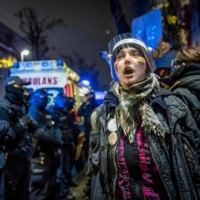 Demonstrators take part in protest in front of the Education Ministry in Warsaw earlier this month as part of a wave of demonstrations against Poland\'s near-total ban on abortion and worsening LGBT rights.  | AFP-JIJI