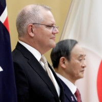 Australian Prime Minister Scott Morrison and Prime Minister Yoshihide Suga have agreed on a reciprocal access agreement, a legal framework that allows the two countries’ militaries to visit for training and joint military operations. | REUTERS