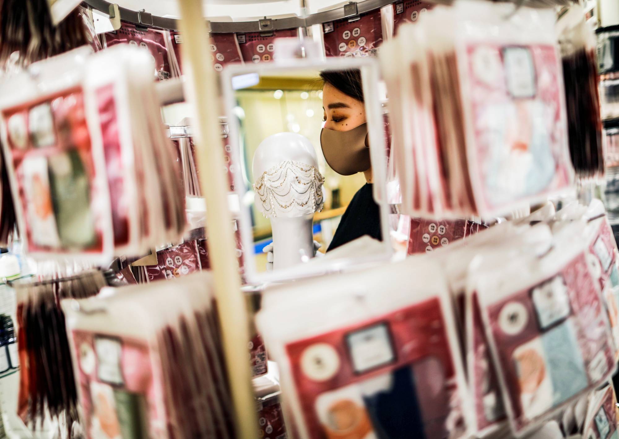 Cox Co. offers a range of masks starting from ¥500 at its online and physical stores. | REUTERS