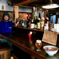 Gathering place: Mio Namikawa — owner, chef and DJ at Magnetico — rustles up some excellent food, not to mention quality mood music. | ROBBIE SWINNERTON
