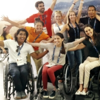 Ileana Rodriguez (seated, center) poses with other staffers of the International Paralympic Committee during the 2016 Summer Paralympics in Rio de Janeiro in September 2016. | ILEANA RODRIGUEZ / VIA KYODO