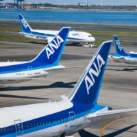 ANA Holdings Inc. will raise as much as ¥332.1 billion via an overseas share placement. | BLOOMBERG