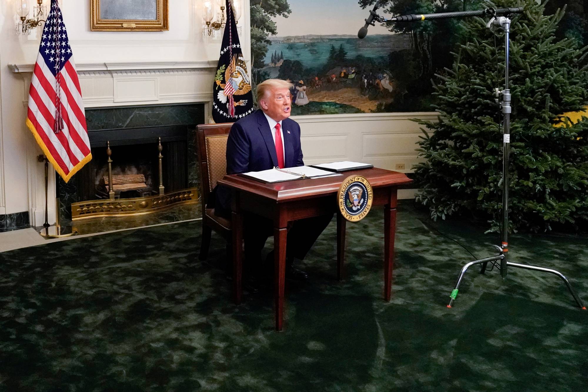 U.S. President Donald Trump participates in a Thanksgiving video teleconference with members of the military at the White House on Thursday.  | REUTERS 