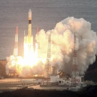 An H2A rocket is launched Sunday at Tanegashima Space Center in Kagoshima Prefecture. | KYODO