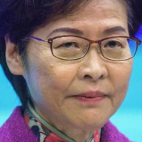 Hong Kong Chief Executive Carrie Lam holds a news conference at the government headquarters in Hong Kong on Wednesday after delivering her annual policy address earlier at the Legislative Council. | AFP-JIJI