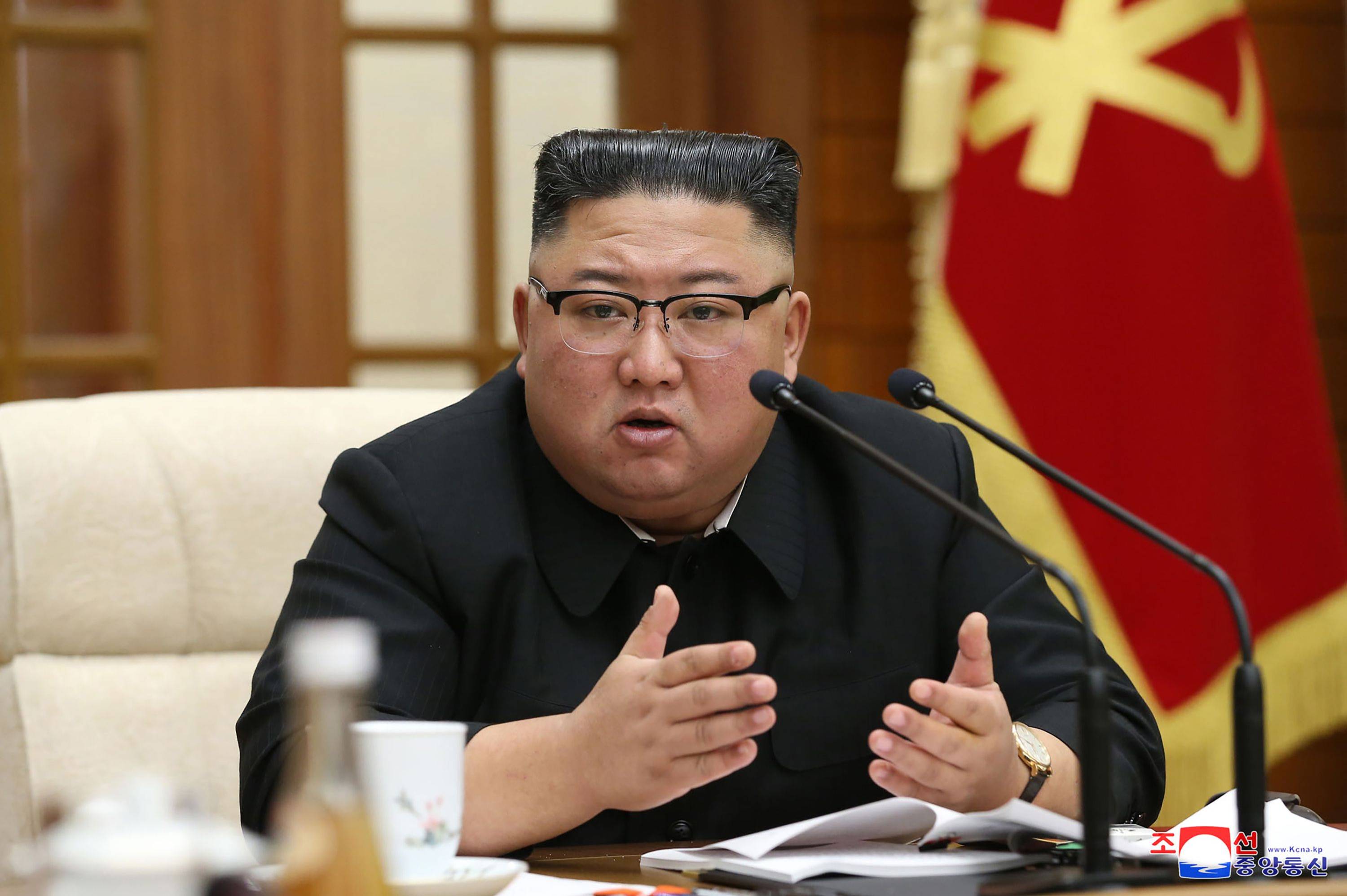 North Korean leader Kim Jong Un attends a meeting of the 21st Political Bureau of the 7th Central Committee of the Workers' Party of Korea in Pyongyang on Sunday.  | KCNA / KNS / VIA AFP-JIJI  