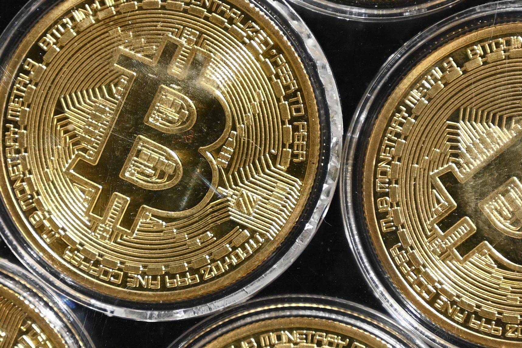 Bitcoin won’t be viewed as an existential threat to the banking system just because its price is soaring. Rather it will be seen as a spur toward a more digital, regulator-friendly post-COVID payments future. | AFP-JIJI