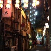 A collection of tiny postwar bars sits in Nonbei Yokocho (Drunkard’s Alley) by the Yamanote Line tracks in Shibuya. | REBECCA SAUNDERS
