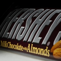 The governments of Ivory Coast and Ghana accused Hershey Co., maker of Kisses, Reese’s and other chocolate treats, of trying to skirt around the $400-a-ton premium they’ve slapped on cocoa. | AP