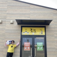 Food support: Kenichi Narita stands in front of the recently opened Kitanagase Community Fridge in Okayama, the first such community fridge in Japan. | COURTESY OF KENICHI NARITA
