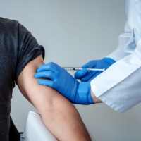 A Pfizer-BioNTech COVID-10 vaccine is administered in Mainz, Germany.    | BIONTECH SE 2020 / VIA REUTERS  