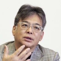 Fujitsu Ltd. President Takahito Tokita will take a 50% pay cut for four months as a result of the Oct. 1 shutdown of the Tokyo Stock Exchange. | KYODO
