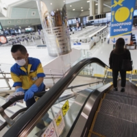 Narita airport in Chiba Prefecture. Japan is considering the resumption of inbound tourism on a limited basis, a report says. | AP