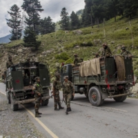 An Indian army convoy on a highway bordering China | BLOOMBERG 