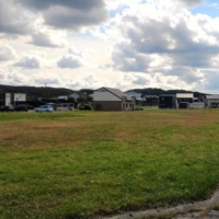 Higashidori village sold part of a piece of land that would have been a used for a residential area developed from agricultural fields to Tohoku Electric for the price of ¥100 million. | KAHOKU SHIMPO
