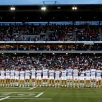 The Pumas line up before their Tri-Nations rugby match against New Zealand\'s All Blacks in Newcastle, Australia, on Nov. 28. | AAP IMAGE / VIA REUTERS 