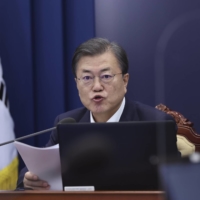 South Korean Presidential Moon Jae-in speaks during a meeting with his senior secretaries at the presidential Blue House in Seoul on Monday. | YONHAP / VIA AP