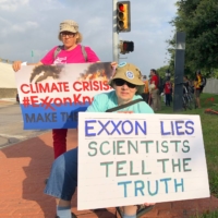 Activists protest against Exxon\'s climate change policies at the ExxonMobil\'s 2019 annual shareholders meeting in Dallas, Texas, in May 2019.  | REUTERS 