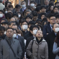 Japan\'s economy is starting to revive as companies resume business, but many analysts expect any recovery to be modest due to a recent resurgence in infections. | BLOOMBERG
