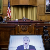 Facebook CEO Mark Zuckerberg testifies via videoconference during a hearing of the House Judiciary Subcommittee on antitrust in Washington in July.  | GRAEME JENNINGS / POOL / VIA THE NEW YORK TIMES