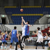 Japan and Taiwan compete behind closed doors during their FIBA Asia Cup qualifier on Feb. 24 in Taipei. Group B\'s remaining 10 games will take place in Japan in late February. | KYODO