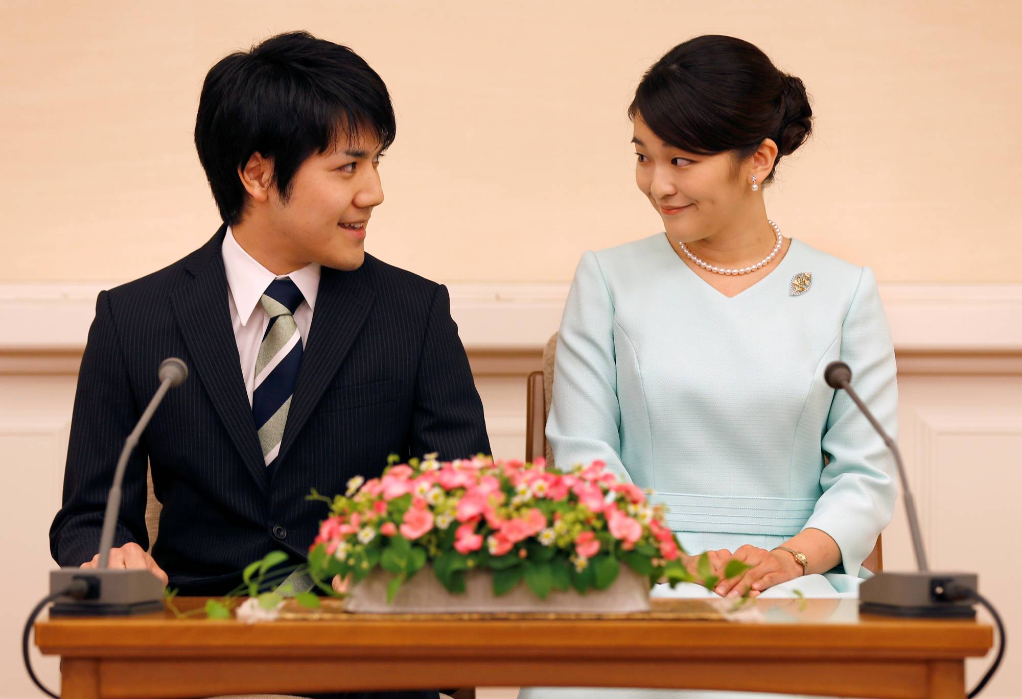 Princess Mako and her fiance, Kei Komuro, attend a news conference to announce their engagement in Tokyo in September 2017. | REUTERS