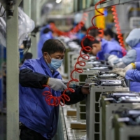An air conditioner production line at a factory in Wuhan, China  | AFP-JIJI