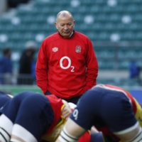 England head coach Eddie Jones watches over warmups before his team\'s Autumn Nations Cup match against France on Dec. 6 in London. | REUTERS