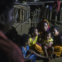 Rita Behera, the widow of Prafulla Behera, with their four daughters on Nov. 10 in Ganjam, India | ATUL LOKE / THE NEW YORK TIMES