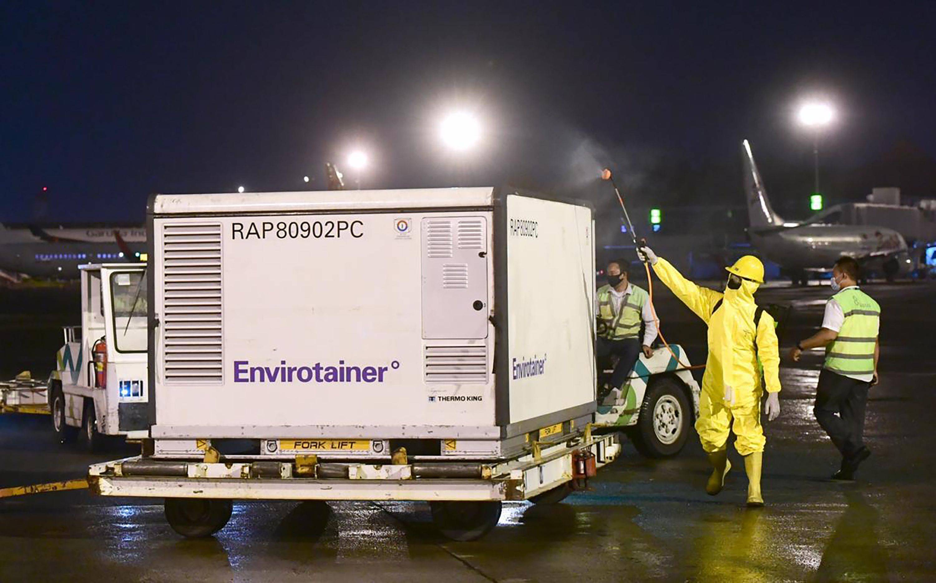 Indonesia received a shipment of 1.2 million doses of Sinovac's COVID-19 vaccine on Dec. 6. The country plans to vaccinate younger citizens first. | INDONESIAN PRESIDENTIAL PALACE / VIA AFP