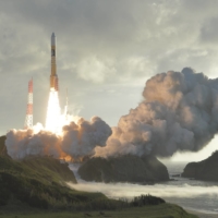 An H-2A rocket carrying a quasi-zenith satellite, Michibiki, lifts off from the Tanegashima Space Center in Kagoshima Prefecture in October 2017. Japan and the United States agreed that U.S. sensors will be mounted on two Michibiki satellites to be launched in fiscal 2023. | KYODO
