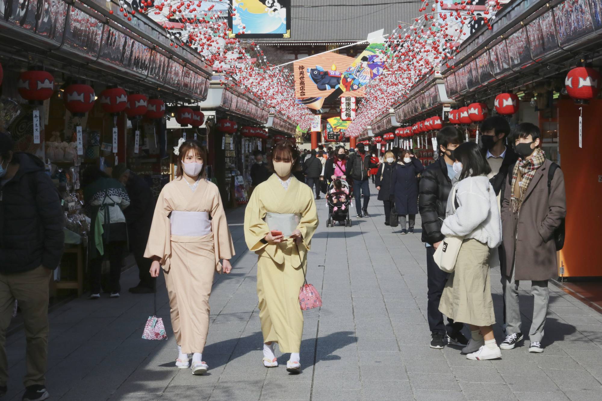 New Year's decorations line a road near Sensoji Temple in Tokyo on Wednesday. | AP