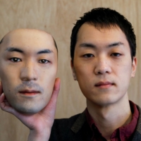 Shuhei Okawara, the owner of mask shop Kamenya Omote, holds a super-realistic face mask based on his real face made by using 3D printing technology, in Tokyo on Wednesday. | REUTERS 