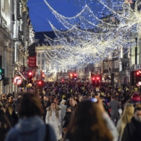 Shoppers crowd Regent Street in London on Saturday ahead of the new Tier 4 restriction measures. | AP