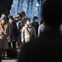 As coronavirus cases rise in Japan, the Ginza shopping district of Tokyo has played host to a series of high-tech hand-washing stations set up by WOTA Corp. | AP